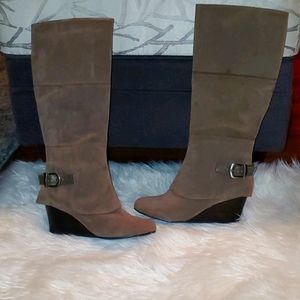 Knee height coffee color boots. Brand:Fergalicious